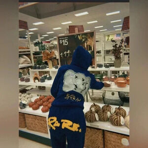 RARE By Rikki Andrea Navy Distress Low Rise Pants ina size Small, NO LONGER MADE